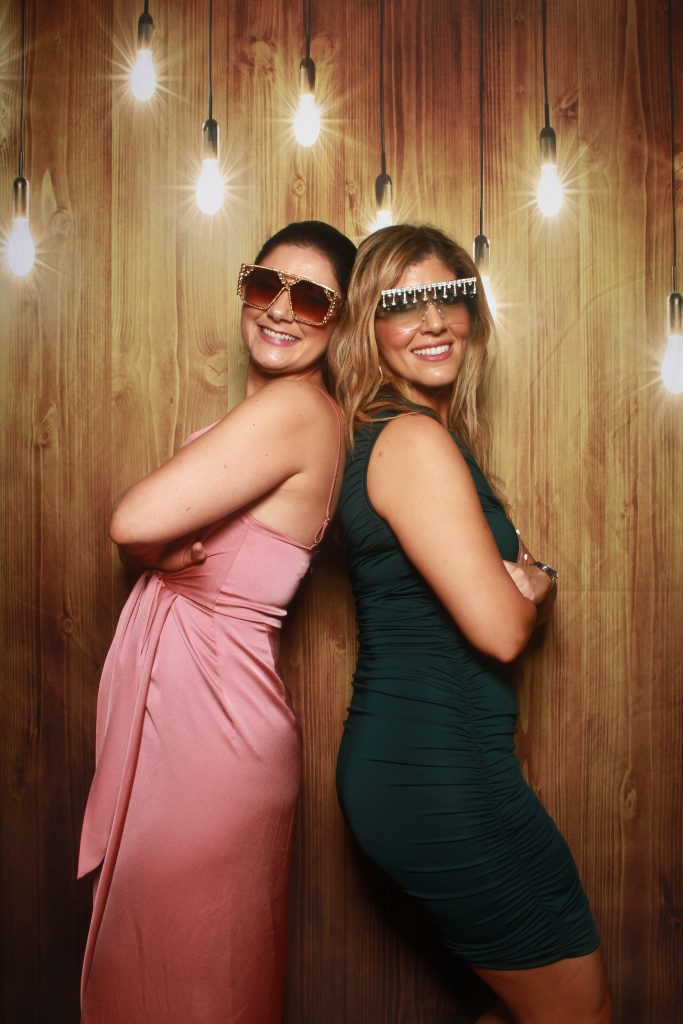 This photo shows an example of what our photo booth hire packages can be used for. Fun photos.
